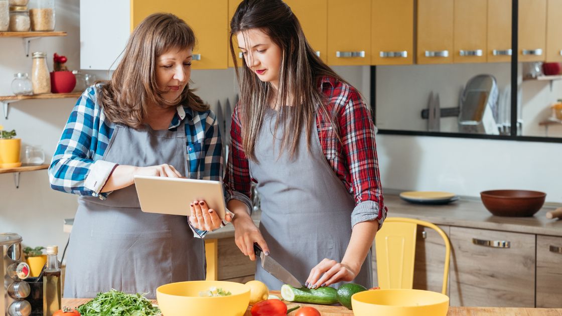 Mother and daughter cooking using online culinary tutorials |#HomeInternetProviders
