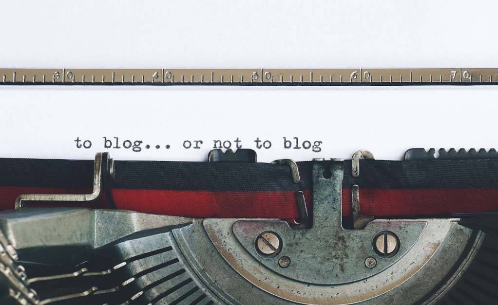 Typewriter typing blog for extra income